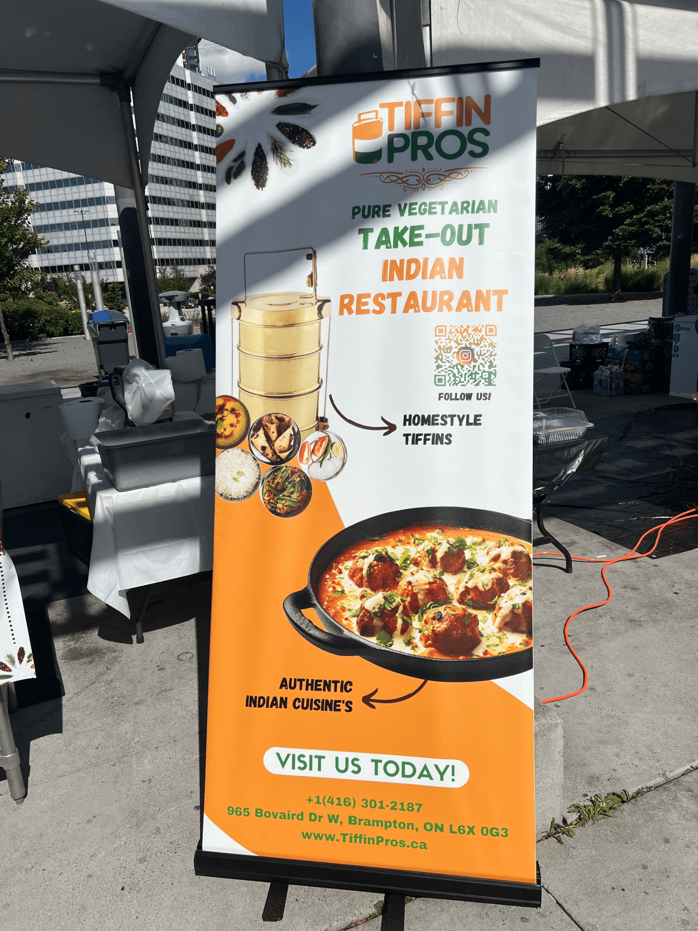 Kitchen team preparing fresh vegetarian curries
